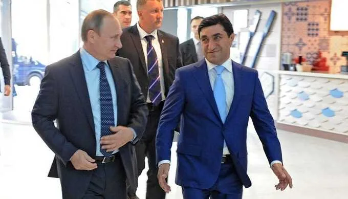 God Nisanov and Vladimir Putin