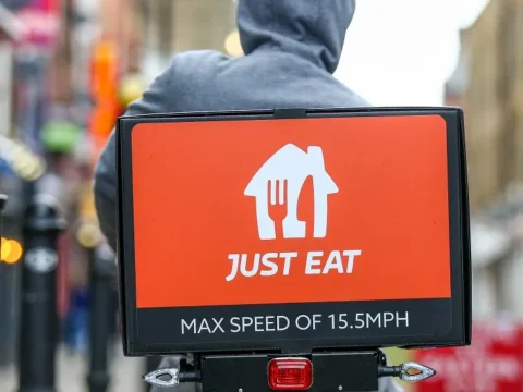 Just Eat Takeaway Reports Positive EBITDA and CFO Departure Amidst Growing Market Challenges