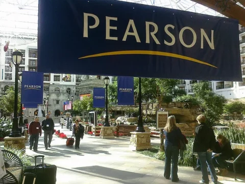 Pearson is cautious on profit forecast
