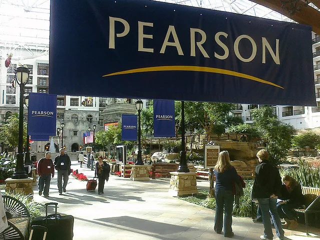 Pearson is cautious on profit forecast